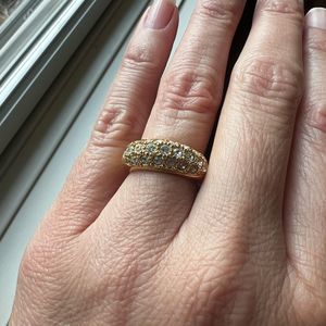 Gold tone fashion crystal band with pave rhinestone detailing Ring size 6.5